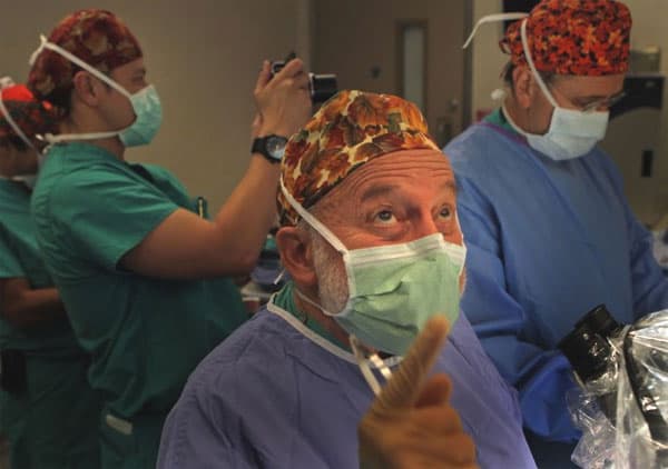 Dr. Sherman Silber "quilts" strips of ovary together, preparing to surgically transplant them onto the exisiting ovary of patient Jenny Remington-Hobbs at St. Luke's Hospital in Chesterfield on Oct. 12, 2012.