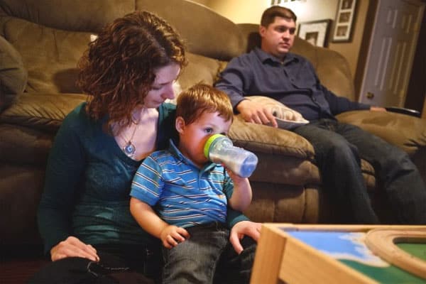 Amy Tucker and her husband, Jason Tucker, relax with their 2 year-old son, Grant, at their home in Columbia, Ill., on Oct. 17, 2012. Amy had an ovary removed and frozen in 1998 before a cancer treatment. In 2009, the ovarian tissue was returned and she became pregnant with Grant.