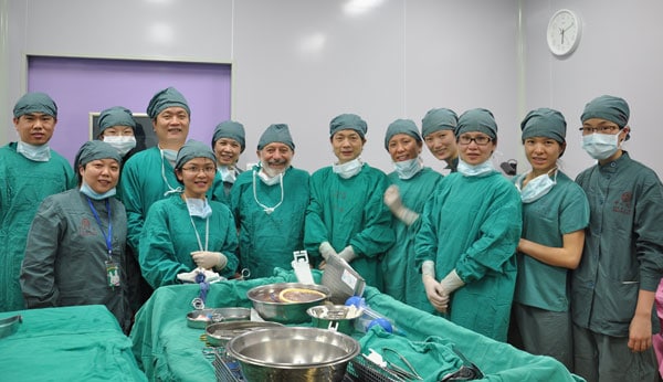 Dr. Silber, center, with Chinese surgical team after successful completion of the operation.