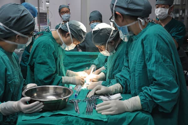 Entire operating room team during surgery.